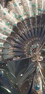 Ornate decorative fan with teal accents.