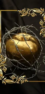 Golden apple with baroque design and wire on black background.