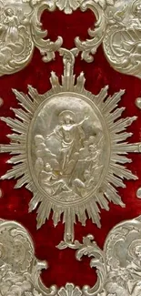 Silver relief on crimson red background with intricate designs.