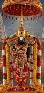 Intricate deity statue in temple setting.