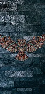 Intricate owl art on dark stone wall background.