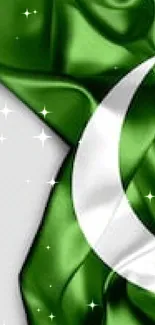 Green silk Pakistan flag with heart symbol design.