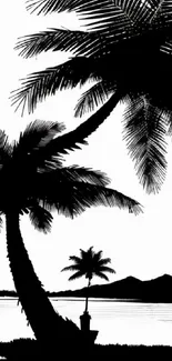 Silhouette of palm trees against a serene island background in black and white.