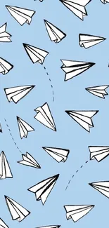 Light blue wallpaper with paper airplanes pattern.