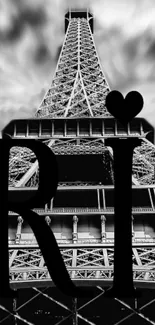 Black and white Eiffel Tower mobile wallpaper with heart symbol.