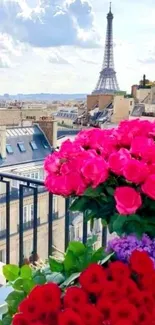 Parisian rooftop view with pink roses and Eiffel Tower in the background.