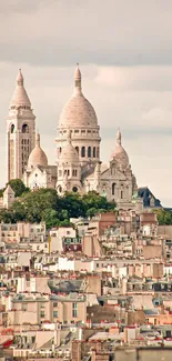 Paris cityscape with Sacré-Cœur under a serene sky.