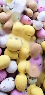 Colorful pastel candy eggs scattered closely.