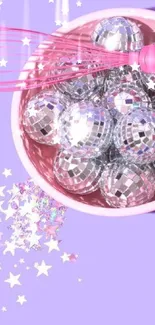 Pastel wallpaper with pink bowl, disco balls, and lavender background.