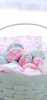 Pastel Easter basket with decorated eggs.