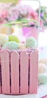 Pastel Easter egg basket with light pink accents.