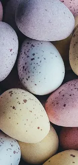 Pastel speckled Easter eggs in soft colors, perfect for spring.