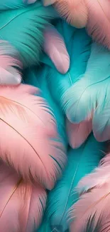 Pastel pink and turquoise feathers mobile wallpaper.