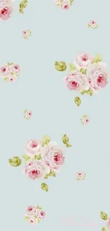 Pastel floral wallpaper with pink roses on a light blue background.