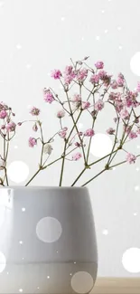 Minimalist wallpaper with pink flowers in a ceramic vase.