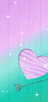 Pink and mint gradient wallpaper with textured heart and arrow.