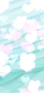 Pastel heart bokeh wallpaper with soft turquoise shades and dreamy lighting.