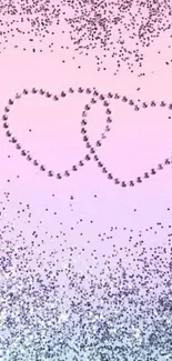 Pastel background with sparkly hearts design.