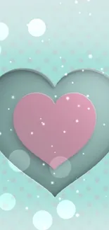 Teal and pink layered heart wallpaper with polka dots.