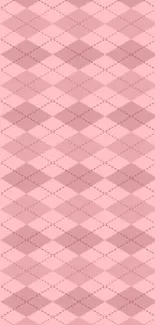 Pastel pink geometric wallpaper with diamond pattern.