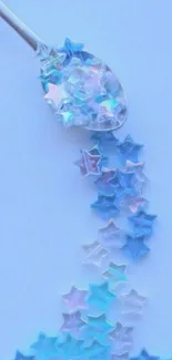 Pastel stars spilling from spoon on blue background.