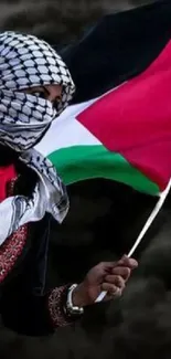 Person holding flag in smoky background, exuding patriotism.