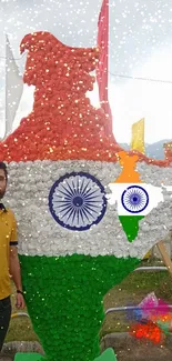 Indian map floral art in flag colors with a person.