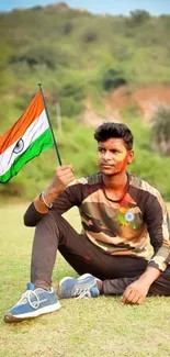 Young man with Indian flag in nature setting.