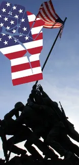 Silhouette of soldiers raising American flag with patriotic elements.