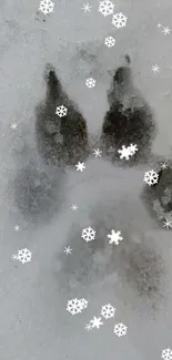 Paw print in snow with snowflakes mobile wallpaper.