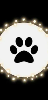 Paw print surrounded by glowing stars on black background.