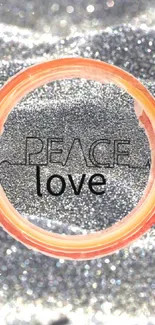 Peace and Love wallpaper with orange circle and silver glitter.