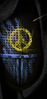 Knight helmet with yellow peace sign on dark background.