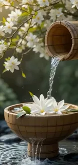 Bamboo water feature with white flowers and flowing water in a tranquil setting.