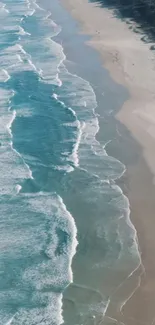 Aerial view of a beach with gentle waves and a serene coastline.