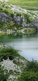 Serene mountain lake with lush green hills and blue sky.