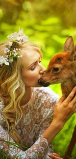 Woman kisses deer in tranquil forest setting wallpaper.