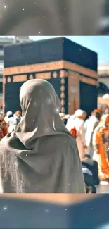 Woman in front of Kaaba, Mecca pilgrimage scene.