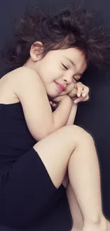 Peaceful child sleeping on a dark background.