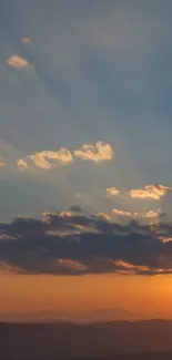 Peaceful sunset sky with vibrant clouds.