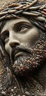 Intricate pebble art of Jesus in earth tones, highlighting serene expression.