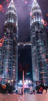 Petronas Towers illuminated at night with colorful heart lights.