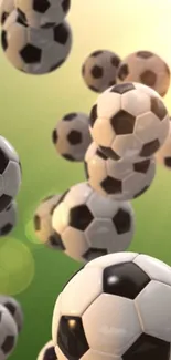 Dynamic soccer balls cascading on a green field backdrop.