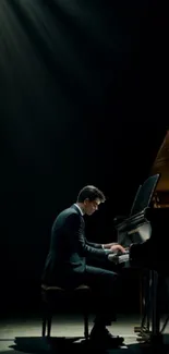 Pianist playing on a stage under soft spotlight, creating a dramatic scene.