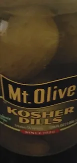 Mt. Olive Kosher Dills jar, perfect for vintage-themed wallpaper.