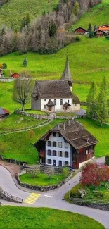 Scenic aerial view of a charming village nestled in lush green countryside.