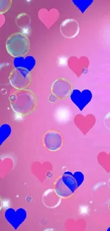 Pink and blue heart wallpaper with glowing bubbles.