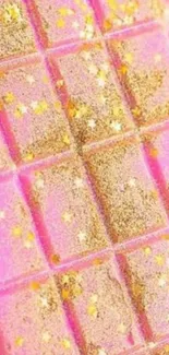 Pink chocolate bar with gold glitter highlights.