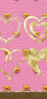 Pink wallpaper with gold heart patterns.