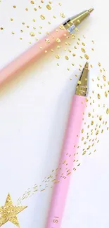 Minimalist wallpaper with pink pens and gold details on white.